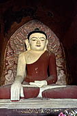 Bagan Myanmar. Buddha Image inside the Dhammayangyi temple. Bagan temples present a very particular depiction of the short-necked